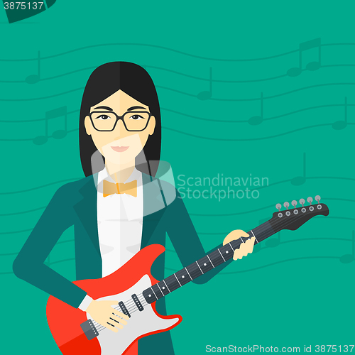 Image of Musician playing electric guitar.