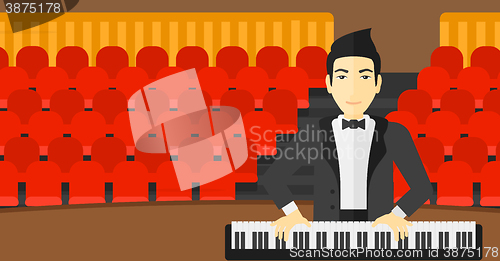 Image of Man playing piano.