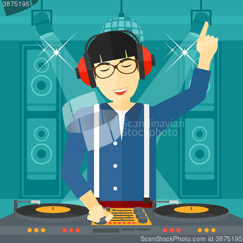 Image of Smiling DJ with console.