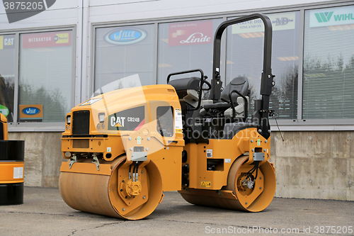 Image of Cat CB24B Utility Compactor on a Yard