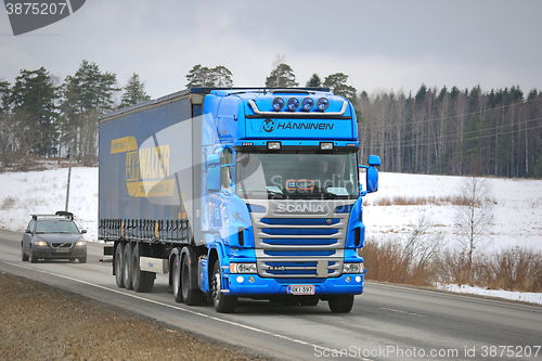 Image of Blue Scania Hauls Curtainsider Cargo Trailer