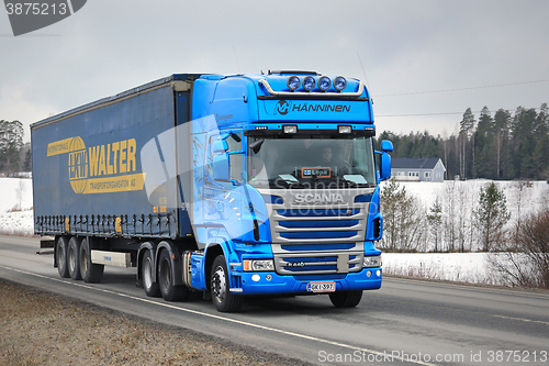 Image of Blue Scania Hauls Curtainsider Cargo Trailer