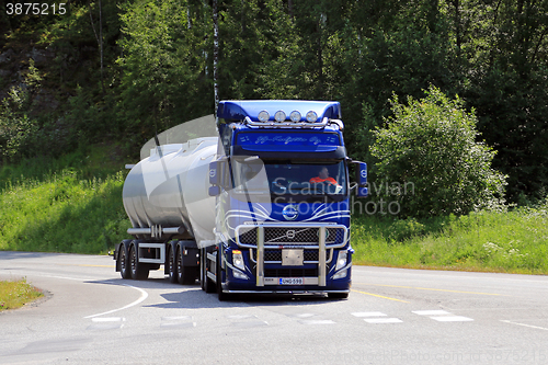 Image of Blue Volvo FH Tank Truck at Road Intersection