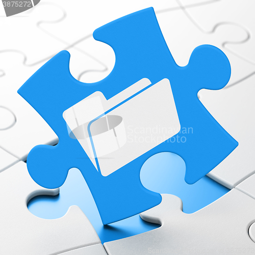 Image of Business concept: Folder on puzzle background
