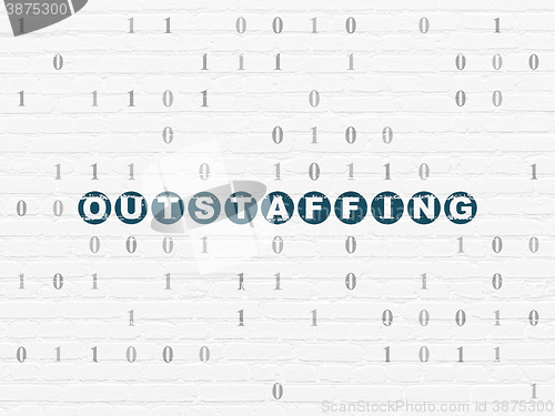 Image of Finance concept: Outstaffing on wall background