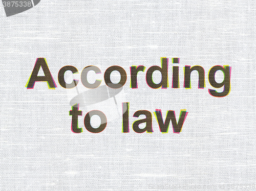 Image of Law concept: According To Law on fabric texture background