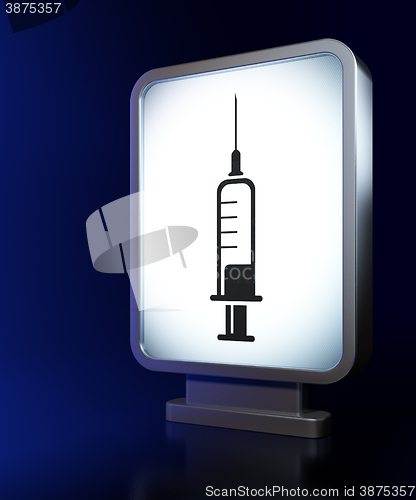 Image of Healthcare concept: Syringe on billboard background