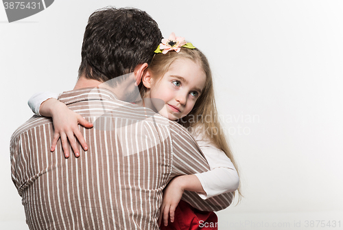 Image of Girl hugging her father  over a white background