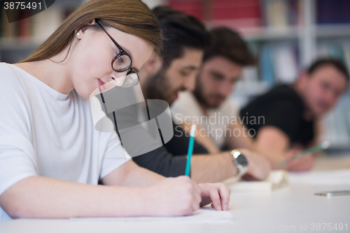 Image of group of students study together in classroom
