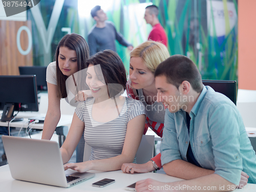 Image of group of students study together in classroom