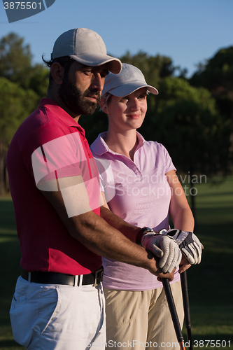 Image of portrait of couple on golf course