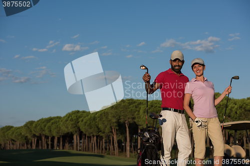 Image of portrait of couple on golf course