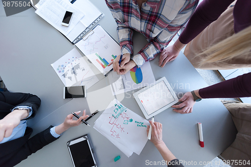 Image of top  view of business people group brainstorming on meeting