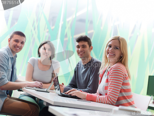 Image of group of students study together in classroom