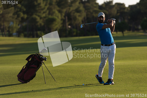 Image of golfer hitting long shot