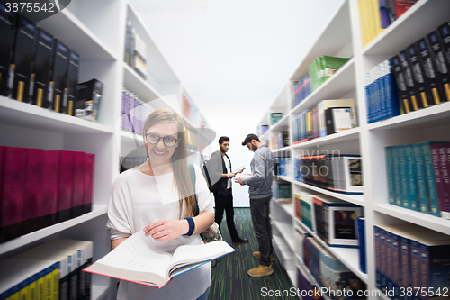 Image of students group  in school  library