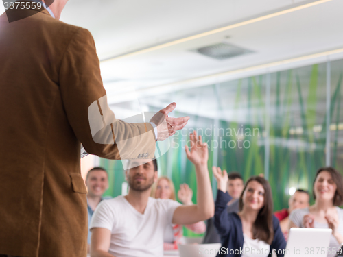 Image of close up of teacher hand while teaching in classroom