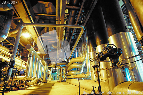 Image of Equipment, cables and piping as found inside of a modern industr