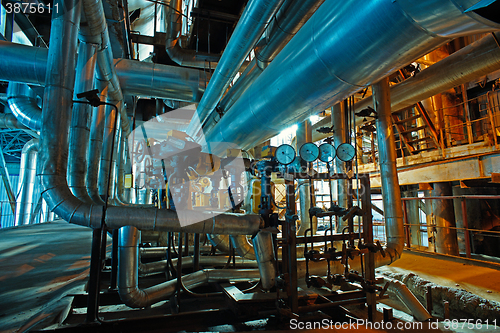 Image of Equipment, cables and piping as found inside of a modern industr