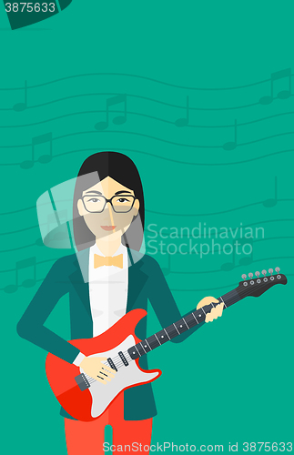 Image of Musician playing electric guitar.