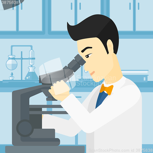 Image of Laboratory assistant with microscope.