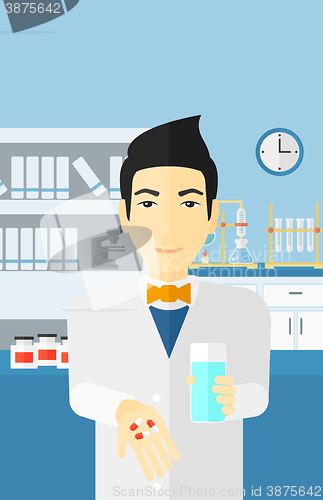 Image of Pharmacist giving pills.