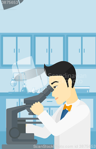 Image of Laboratory assistant with microscope.