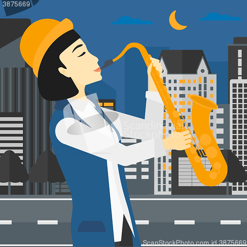 Image of Woman playing saxophone.