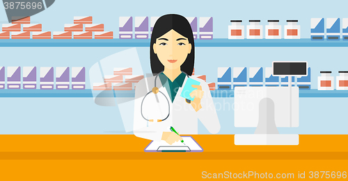 Image of Pharmacist taking notes.