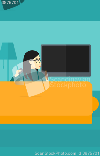 Image of Woman watching TV.