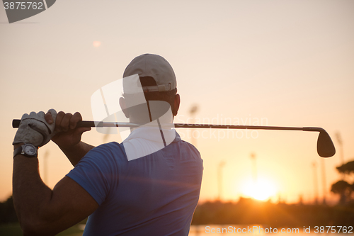 Image of golfer hitting long shot