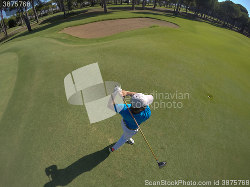 Image of top view of golf player hitting shot