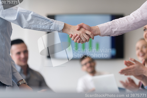 Image of business womans handshake