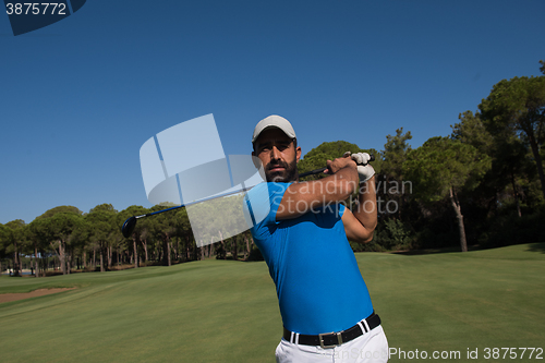 Image of golf player hitting shot