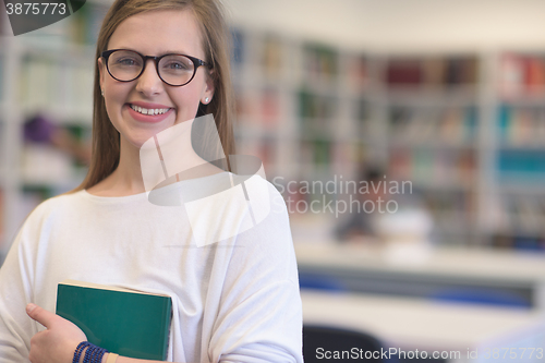 Image of portrait of female student in library