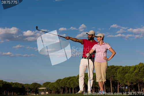 Image of portrait of couple on golf course