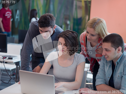 Image of group of students study together in classroom