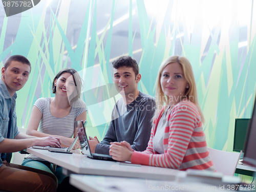 Image of group of students study together in classroom