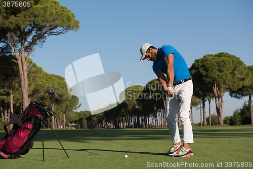 Image of golf player hitting shot