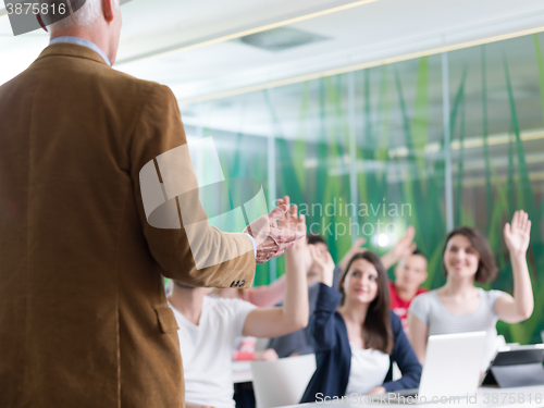 Image of close up of teacher hand while teaching in classroom