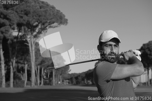 Image of golf player hitting shot