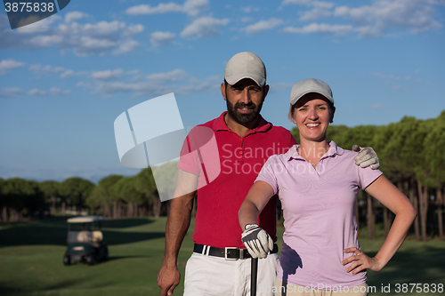Image of portrait of couple on golf course