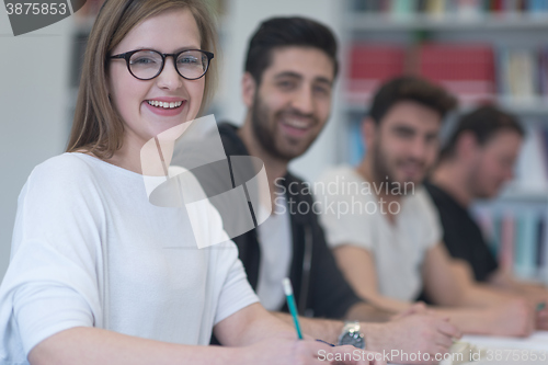 Image of group of students study together in classroom