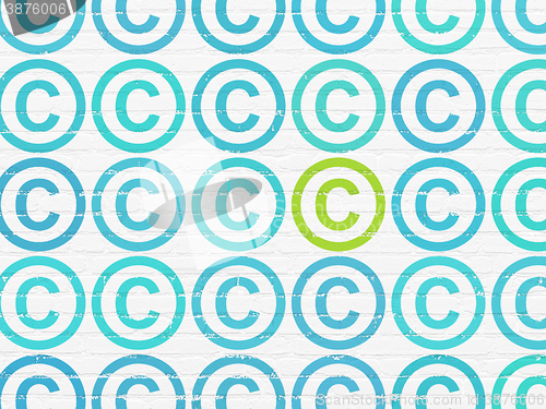 Image of Law concept: copyright icon on wall background