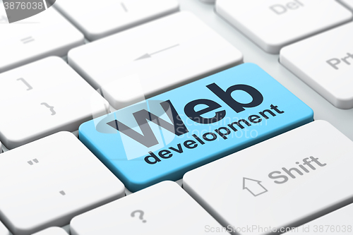 Image of Web development concept: Web Development on computer keyboard background