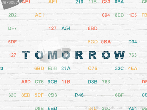 Image of Time concept: Tomorrow on wall background