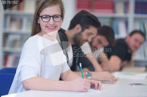 Image of group of students study together in classroom