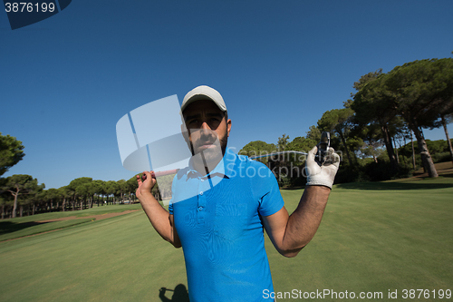 Image of golf player portrait at course