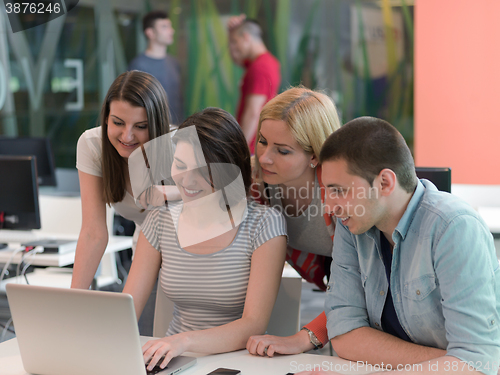 Image of group of students study together in classroom