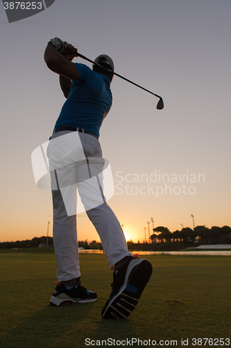 Image of golfer hitting long shot